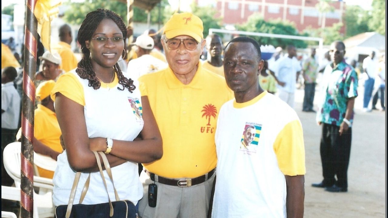 Farida and her father (far right) at a rally in Lome, Togo, January 2008