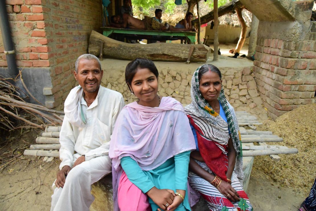 Ranji pictured with her parents in Uttar Pradesh, northern India.