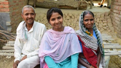 Ranji pictured with her parents in Uttar Pradesh, northern India.