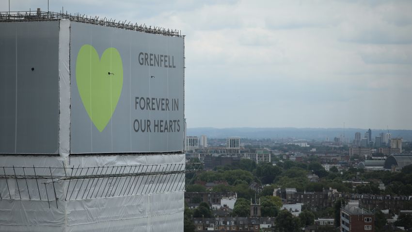 LONDON, ENGLAND - JUNE 13:  A sign with 'Grenfell Forever In Our Hearts' is displayed on the top of Grenfell Tower on June 13, 2018 in London, England. Tomorrow marks the one year anniversary since the Grenfell Tower fire in which 71 lost their lives. (Photo by Dan Kitwood/Getty Images)