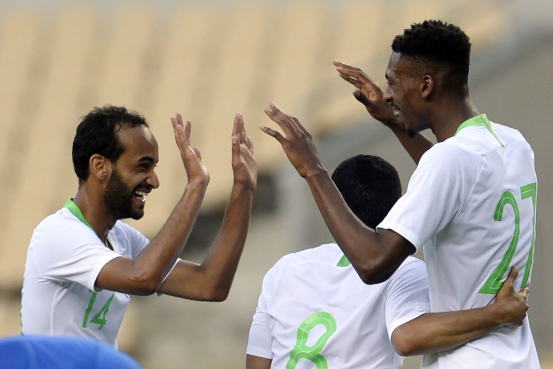 Saudi Arabia midfielder Mohamed Kanno celebrates scoring against Greece in a World Cup warm up.