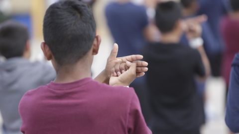 A boy waits in line in the Casa Padre shelter in Brownsville, Texas, on June 13, 2018. The shelter is run by non-profit Southwest Key Programs.