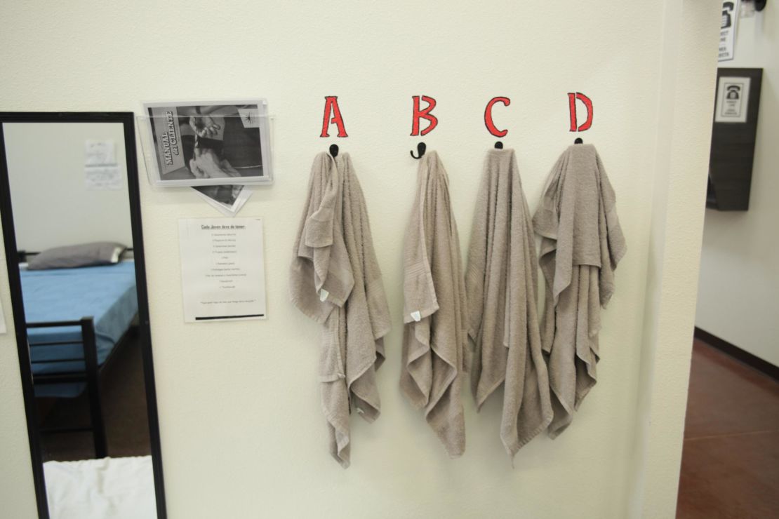 Towels hang on a wall at the shelter, where more than 1,400 undocumented boys are currently housed.
