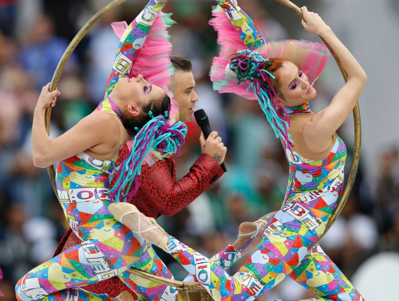 British pop star Robbie Williams headlined the opening ceremony.