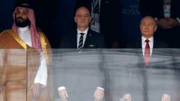 FIFA President Gianni Infantino, second from left, and Russian President Vladimir Putin, second from right, stand for the anthem prior to the the group A match between Russia and Saudi Arabia which opens the 2018 soccer World Cup at the Luzhniki stadium in Moscow, Russia, Thursday, June 14, 2018. (AP Photo/Pavel Golovkin)
