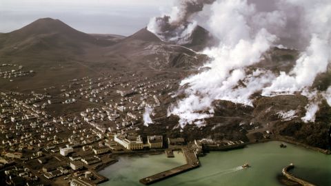 Black ashes cover the town of Vestmannaeyjar on the island of Heimaey after the eruption of the Eldfell volcano in 1973.
