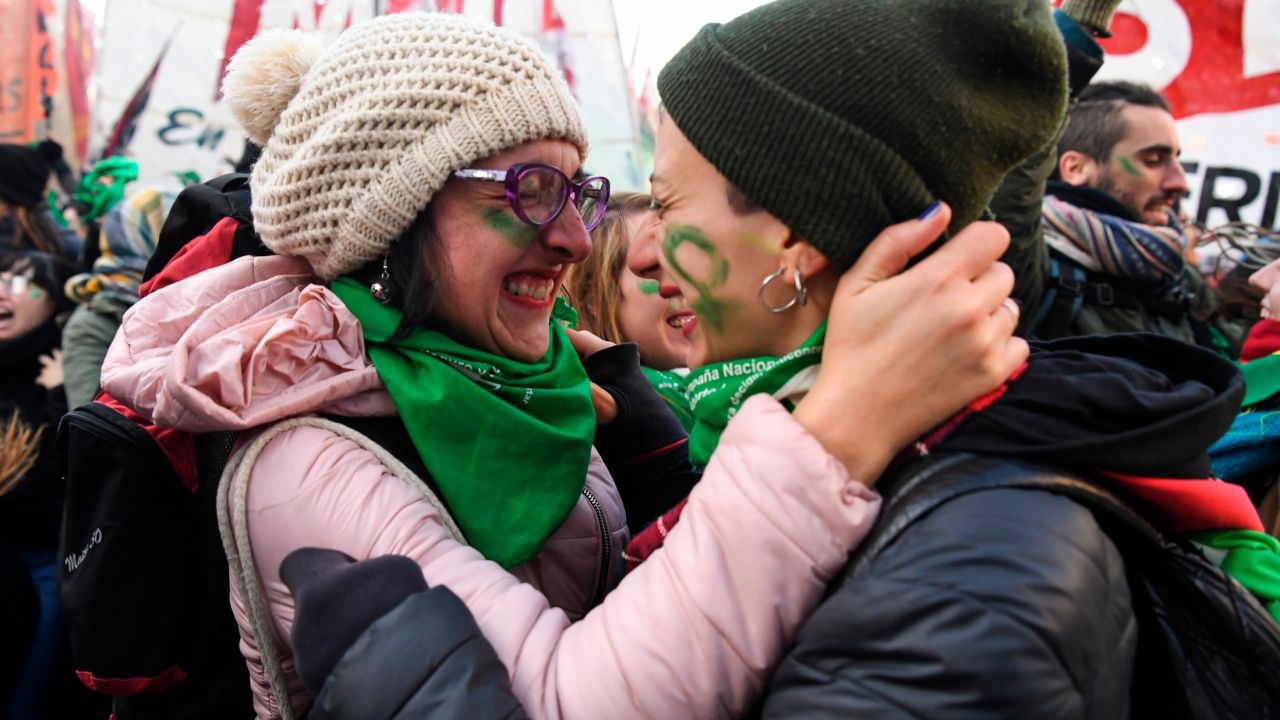 Supporters of legalized abortion embrace Thursday after the the vote in the Chamber of Deputies.