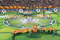 Artists perform in the World Cup's opening ceremony.
