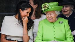 CHESTER, ENGLAND - JUNE 14:  Queen Elizabeth II sitts and laughs with Meghan, Duchess of Sussex during a ceremony to open the new Mersey Gateway Bridge on June 14, 2018 in the town of Widnes in Halton, Cheshire, England. Meghan Markle married Prince Harry last month to become The Duchess of Sussex and this is her first engagement with the Queen. During the visit the pair will open a road bridge in Widnes and visit The Storyhouse and Town Hall in Chester.  (Photo by Jeff J Mitchell/Getty Images)