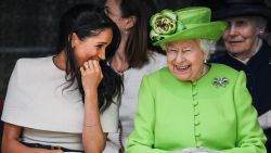 CHESTER, ENGLAND - JUNE 14:  Queen Elizabeth II sitts and laughs with Meghan, Duchess of Sussex during a ceremony to open the new Mersey Gateway Bridge on June 14, 2018 in the town of Widnes in Halton, Cheshire, England. Meghan Markle married Prince Harry last month to become The Duchess of Sussex and this is her first engagement with the Queen. During the visit the pair will open a road bridge in Widnes and visit The Storyhouse and Town Hall in Chester.  (Photo by Jeff J Mitchell/Getty Images)