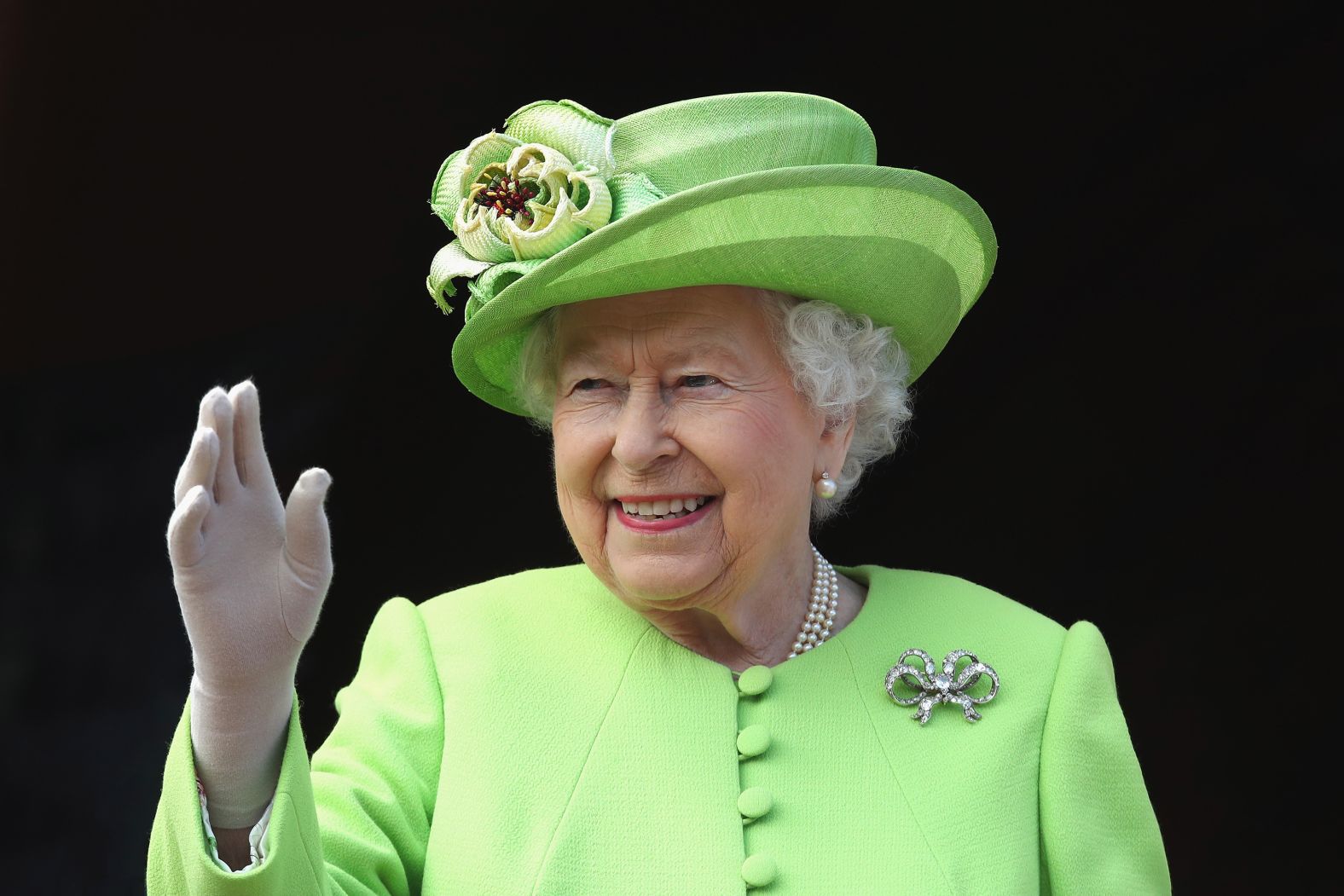 Queen Elizabeth waves during her visit to Chester Town Hall.