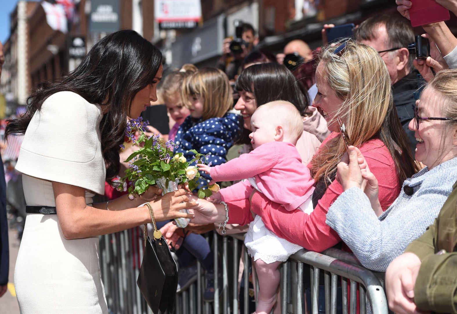 Meghan greets well-wishers in Chester.