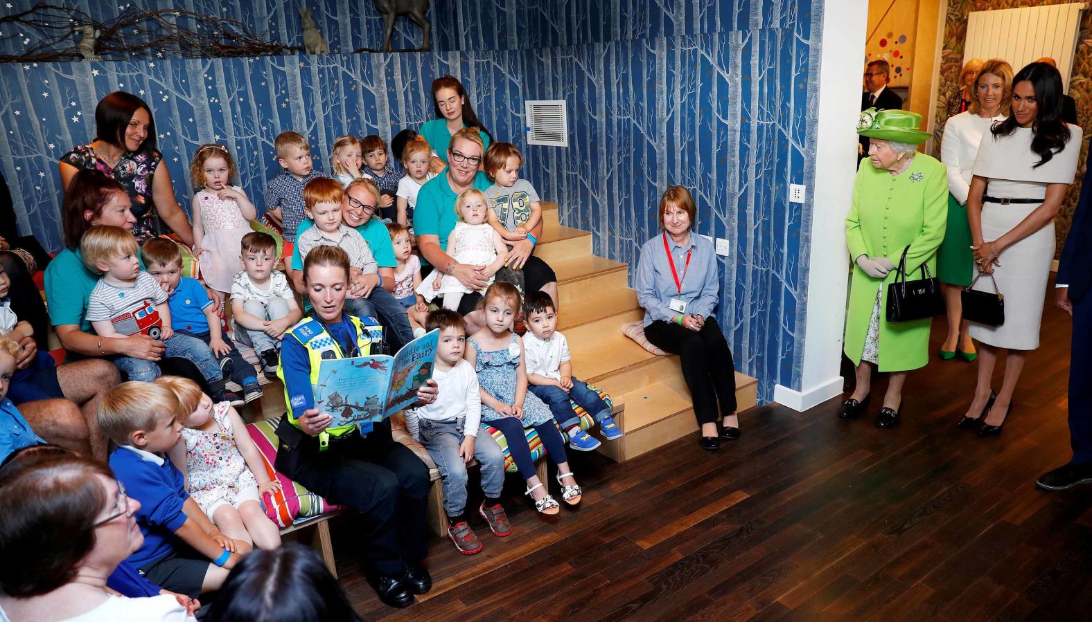 Children look on as the Queen and Duchess arrive at Storyhouse.