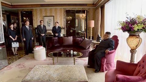The video showed Kim surrounded by aides at the St. Regis Hotel, Singapore.