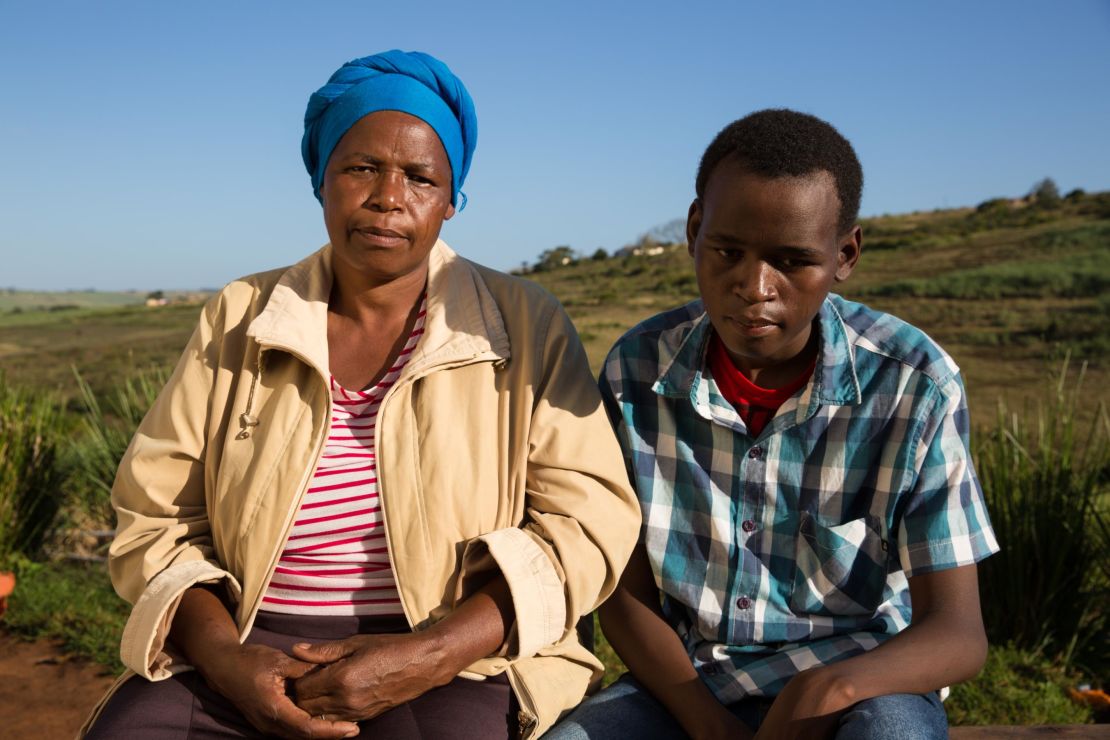 Khumbulani Shandu and his mother at their homestead in KwaZulu-Natal. Khumbulani was left deaf and partially blind because of toxic TB drugs.