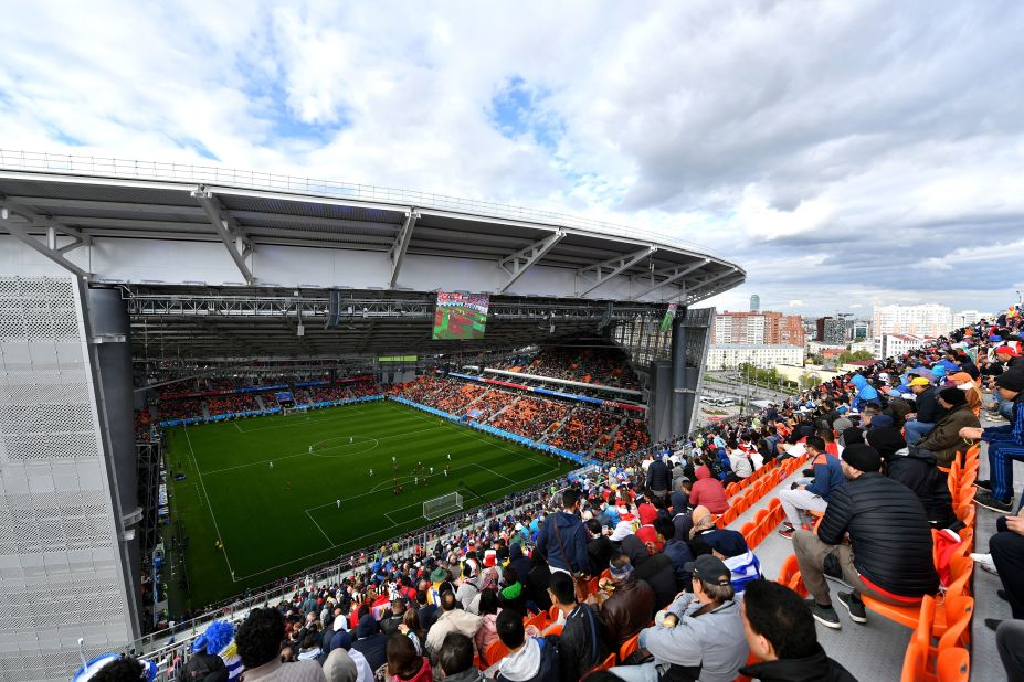 Fans watch the Egypt-Uruguay match from temporary seats set up at the Ekaterinburg Arena. The seats had to be installed to meet FIFA's minimum-seating requirement.