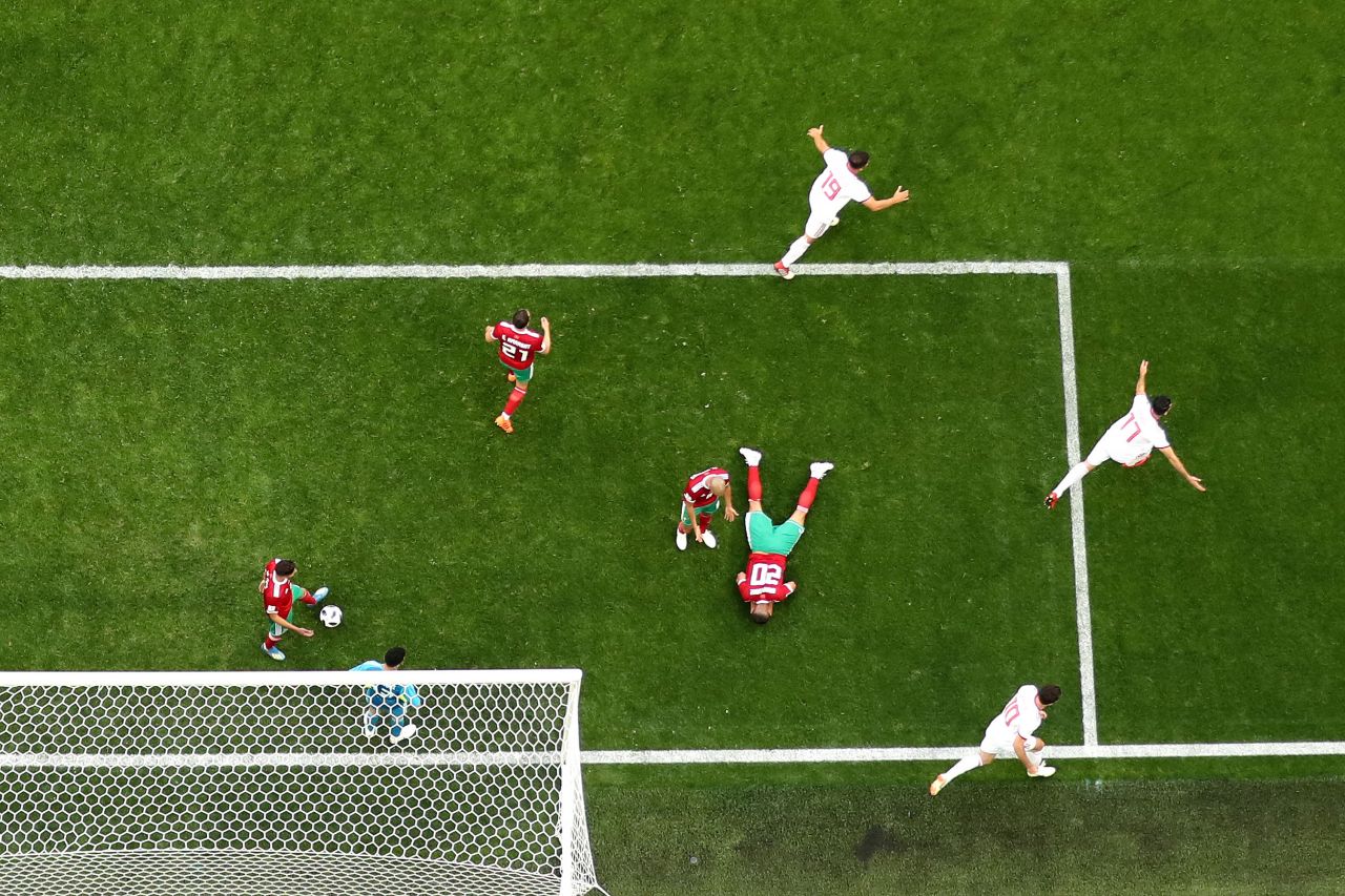 Morocco's Aziz Bouhaddouz lies on the ground after heading the ball into his own net late in stoppage time on June 15. The whistle was blown just a few moments later, and Iran won 1-0.