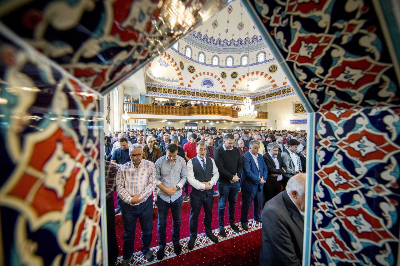 People pray at the Mevlana mosque in Rotterdam, Netherlands.
