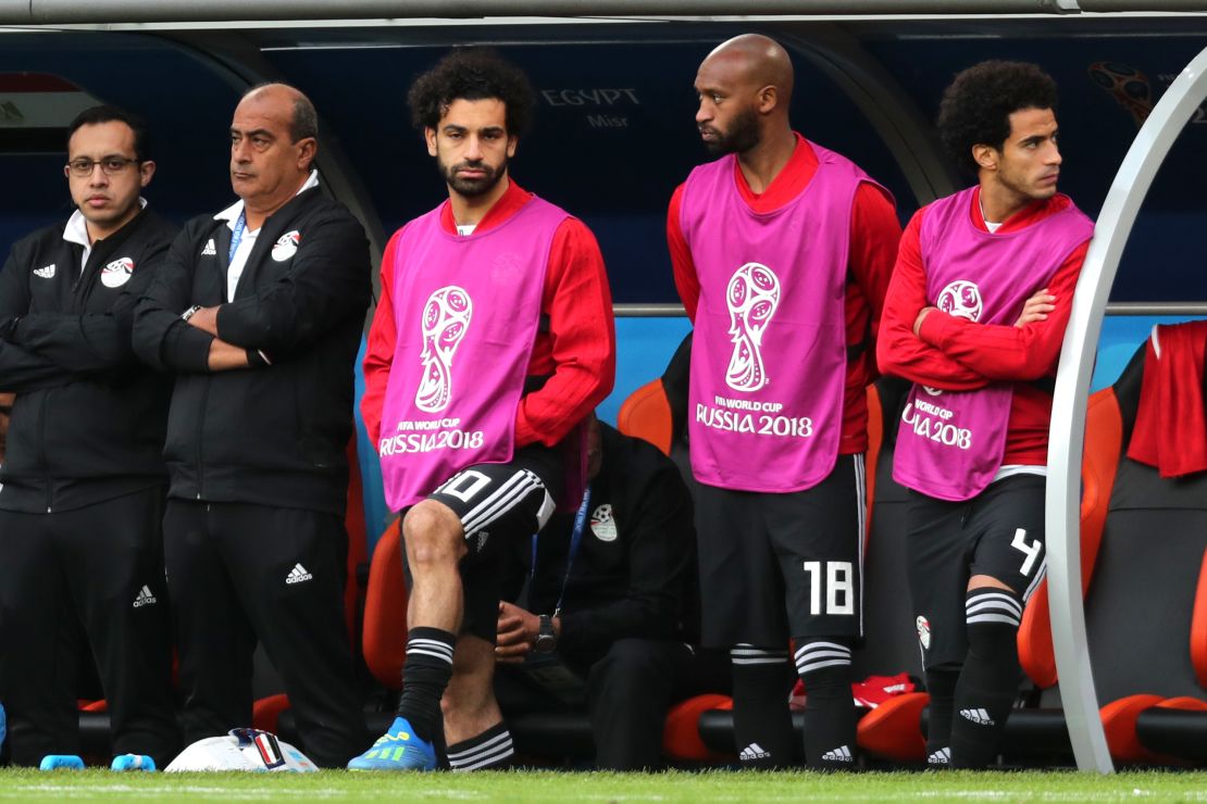 Mohamed Salah looks on dejectedly from the bench after Uruguay's late winner.