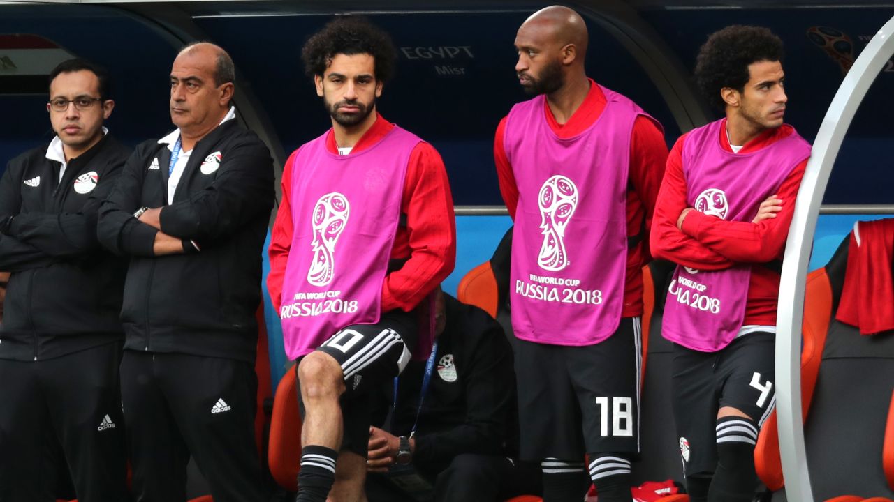 Mohamed Salah looks on dejectedly from the bench after Uruguay's late winner.