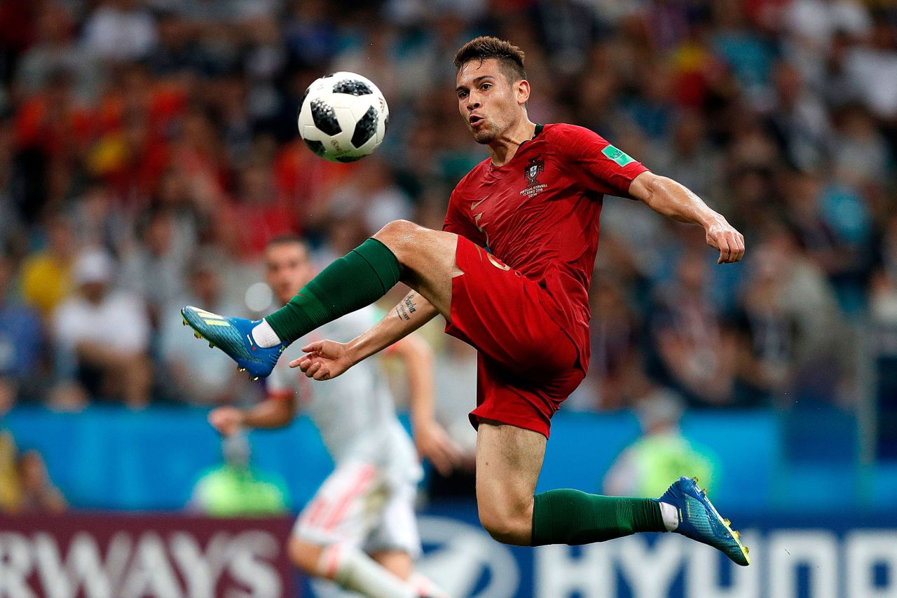 Portuguese defender Raphael Guerreiro controls the ball in the match against Spain.