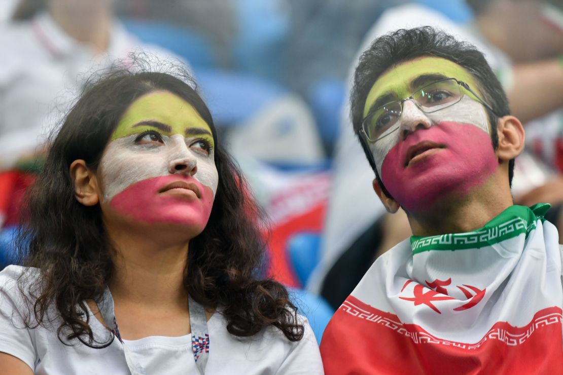 Iran supporters look on prior to the  clash against Morocco.