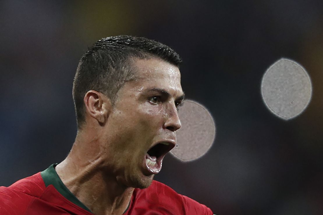 Portugal's forward Cristiano Ronaldo celebrates scoring his third goal during the Russia 2018 World Cup Group B football match between Portugal and Spain.