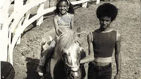 Fredricka Whitfield horseback riding at age nine. 