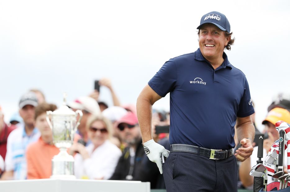 Phil Mickelson made the weekend and will play in front of his adoring New York crowds on his 48th birthday Saturday as he chases the one major he needs to complete the set.