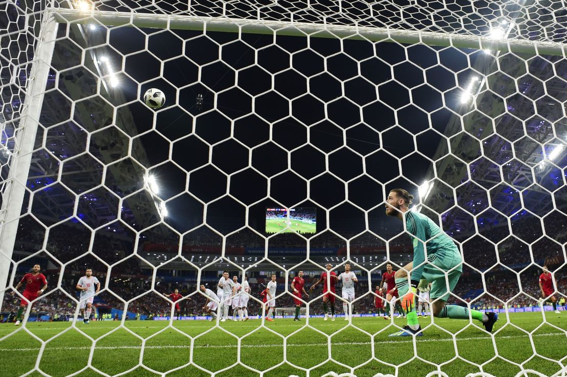 De Gea is helpless as Ronaldo's freekick hits the net.