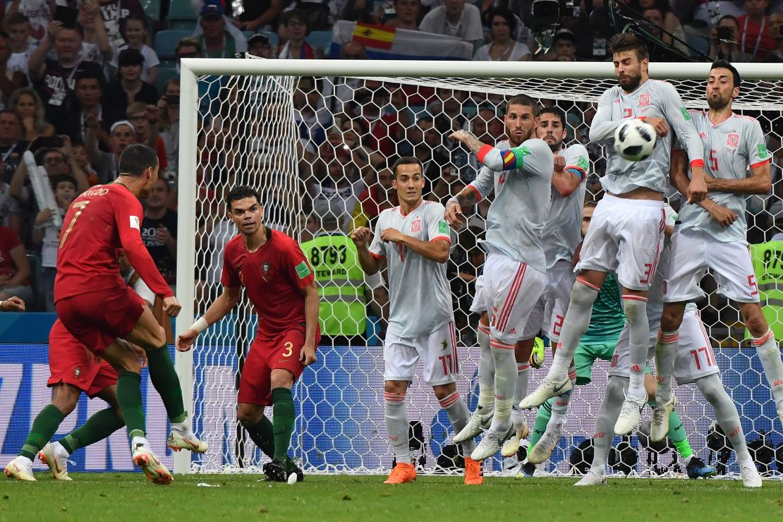 In the 88th minute, Ronaldo steps up after Gerard Pique concedes a foul on the edge of the box.