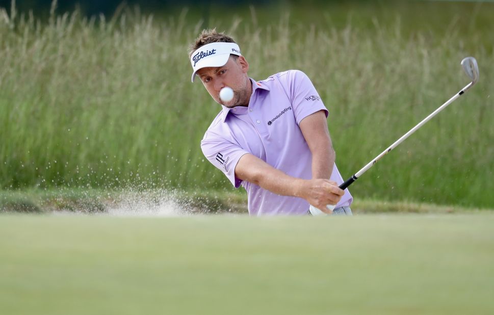 England's Ian Poulter inched to within one shot of Johnson but made a triple-bogey on the 17th and added a bogey on 18 to undo all his good work.