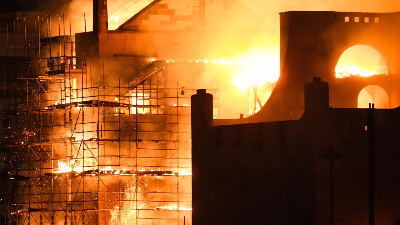GLASGOW, SCOTLAND - JUNE 16:  Fire fighters battle a blaze at the Mackintosh Building at the Glasgow School of Art for the second time in four years on June 16, 2018 in Glasgow, Scotland. In May 2014 it was devastated by a huge fire leading to a multi-million pound restoration due to complete in 2019. It was built in the late 1890's by Charles Rennie Mackintosh, then a junior draughtsman, and is widely considered to be his masterpiece. (Photo by Jeff J Mitchell/Getty Images)