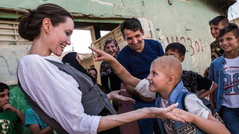 UNHCR Special Envoy Angelina Jolie meets a child during a visit on June 16, 2018, to Mosul, Iraq.