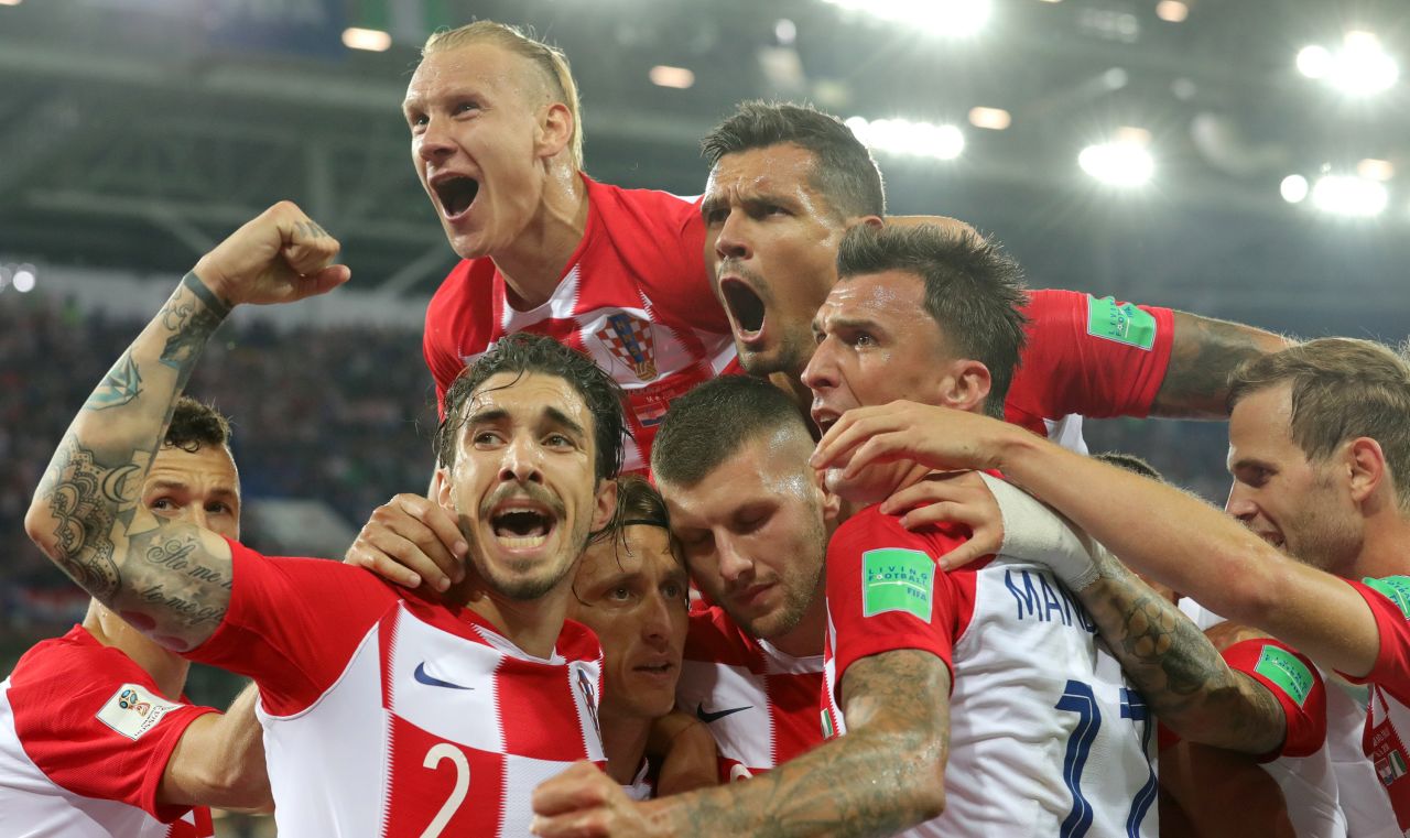 Croatian players celebrate after Luka Modric scored the second goal of their 2-0 win against Nigeria on June 16.