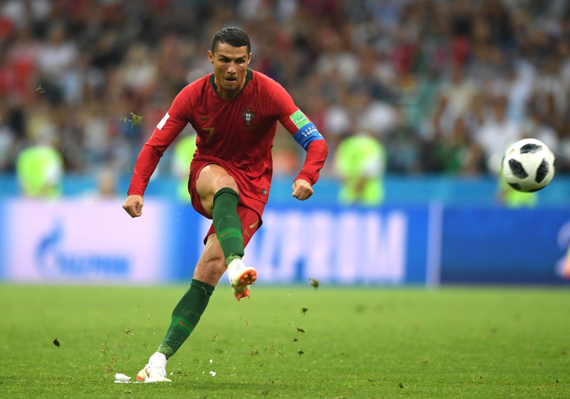 Ronaldo scores his third goal for Portugal in the 3-3 draw against Spain at the World Cup