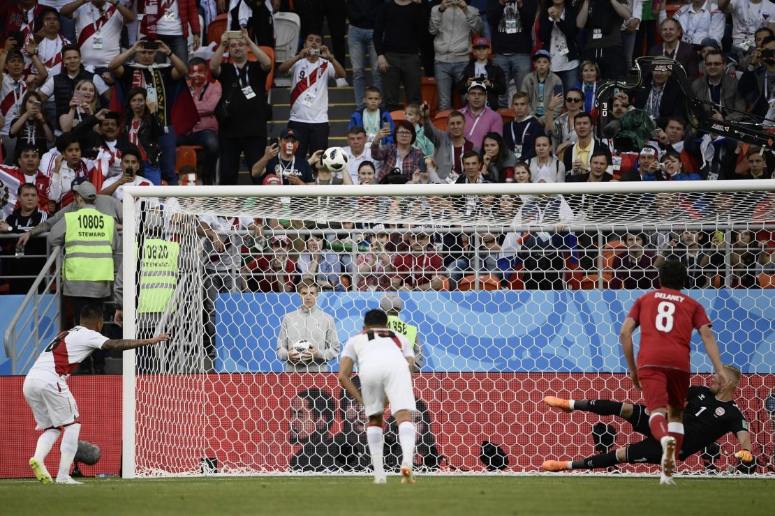 Cueva blasts his penalty high over the bar.