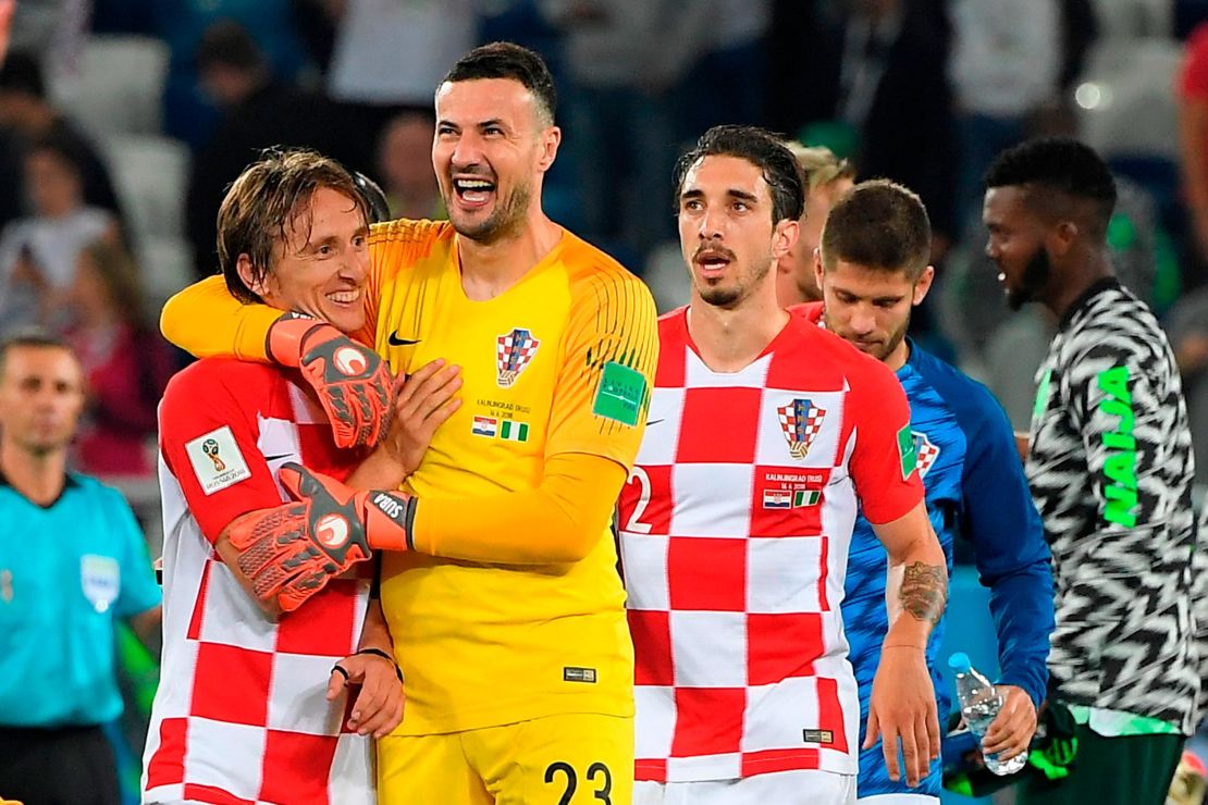 Croatia goalkeeper Danijel Subašic celebrates with captain Luka Modric at the final whistle.