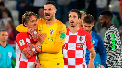 Croatia goalkeeper Danijel Subašic celebrates with captain Luka Modric at the final whistle.