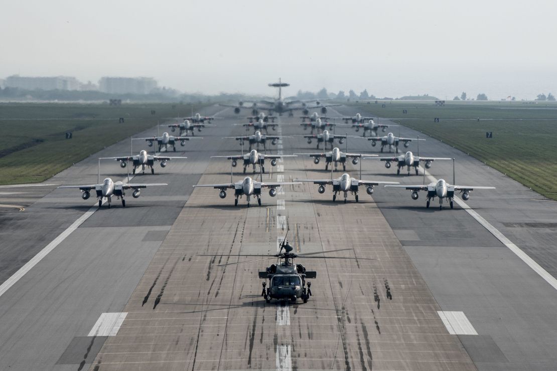 US military aircraft conduct an "elephant walk" exercise at Kadena Air Base on Okinawa in 2017. Experts fear US forces in Japan are concentrated on too few bases.