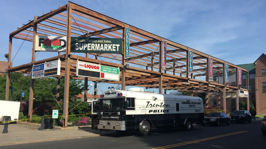 Multiple people were wounded early Sunday, June 17, 2018, when shooting broke out at the Art All Night festival in Trenton, New Jersey, early Sunday, sending people stampeding from the scene and leaving one suspect dead and at least 20 people injured, a local prosecutor said. (Paige Gross/NJ.com/The Star-Ledger via AP)