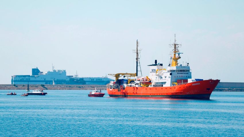 The Aquarius rescue ship enters the port of Valencia on June 17, 2018. - The 630 migrants whose rescue sparked a major migration row in Europe began disembarking in Spain after a turbulent week that saw Italy turn away the Aquarius ship. (Photo by Pau Barrena / AFP)        (Photo credit should read PAU BARRENA/AFP/Getty Images)