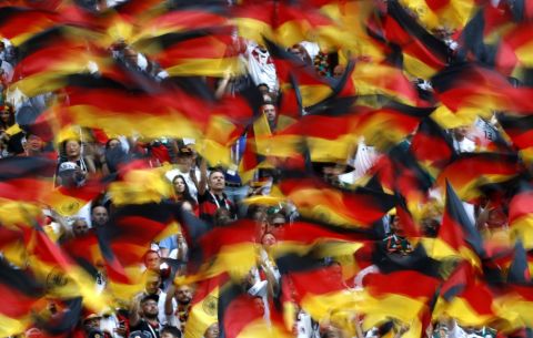 Fans wave German flags before facing off with Mexico.