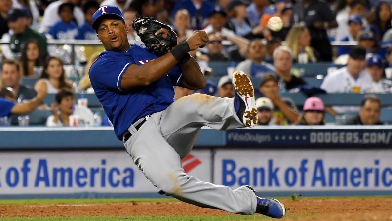 Adrian Beltre of the Texas Rangers makes a play for an out at first in the game against the Los Angeles Dodgers on Wednesday, June 13 in Los Angeles. The Dodgers won the game 3-2.