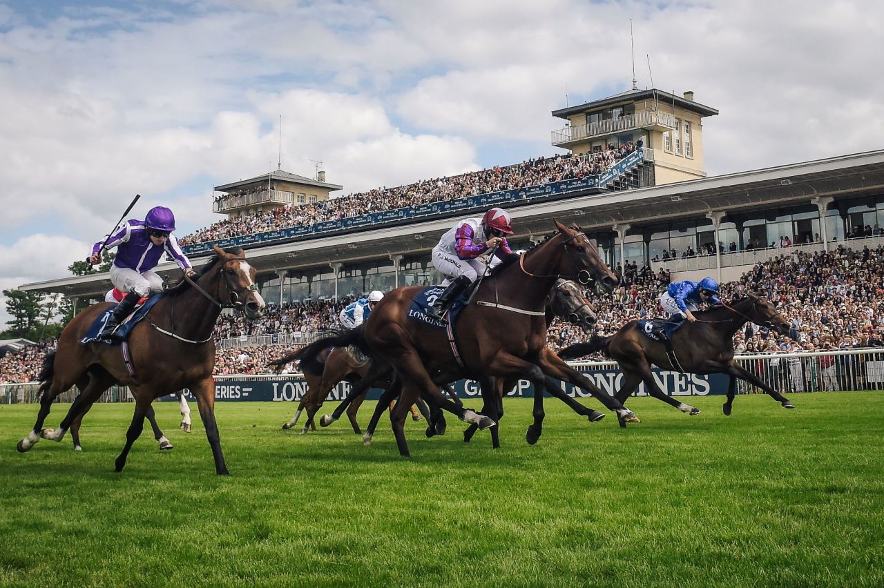 Laurens (center) beat Godolphin's Musis Amica (right) and Homerique to victory in the Prix de Dianes in 2018. 
