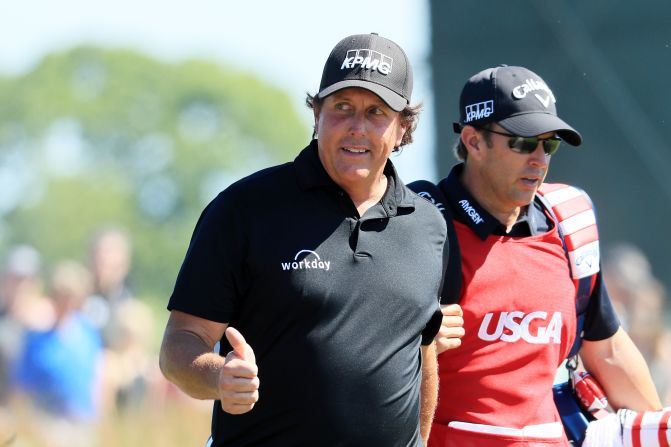 Phil Mickelson was back a day after sparking the "putt-gate" controversy when he hit his still moving ball back towards the hole. The left-hander, who improved on Saturday's 81 with a closing 69 to end +16, declined to offer any further comment on the incident.
