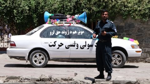 A vehicle belonging to the Helmand peace march reads "The People's Peace Movement."