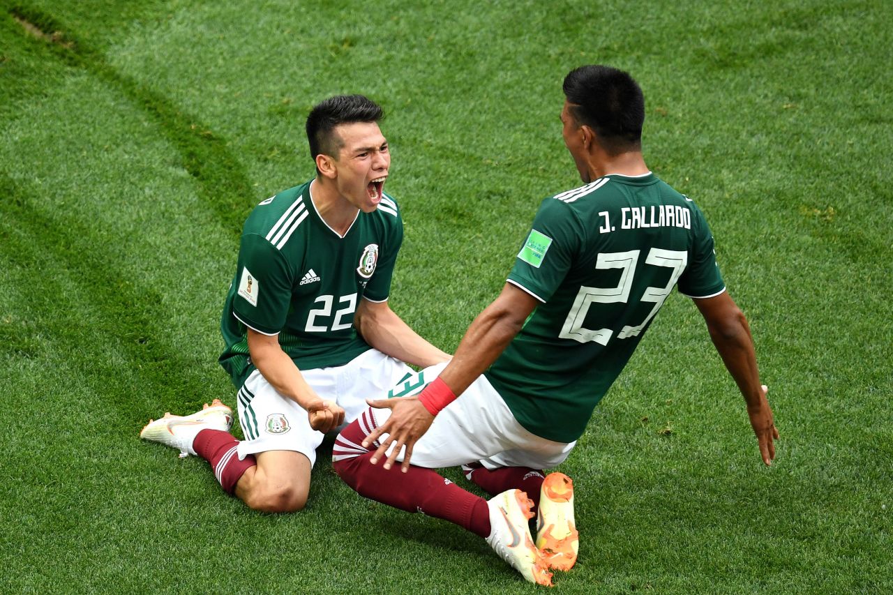 Mexico's Hirving Lozano, left, celebrates with Jesus Gallardo after scoring the only goal in the upset victory over Germany on June 17.