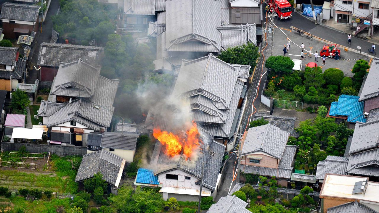 Fire breaks out at a house after the earthquake.