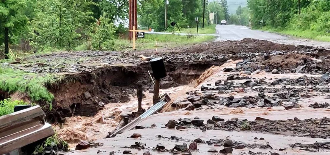 Flash flooding in Michigan wiped out roads in the Houghton area on Sunday.